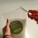 Step 12: Cut small hole in bag of filler
