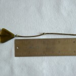 Measure 2" from the second knot and make a third knot