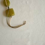 Attach jump ring and clamp