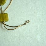 Attach jump ring and clasp