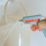 Glue strips to pail or bucket