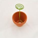 Glue place card holder inside pot